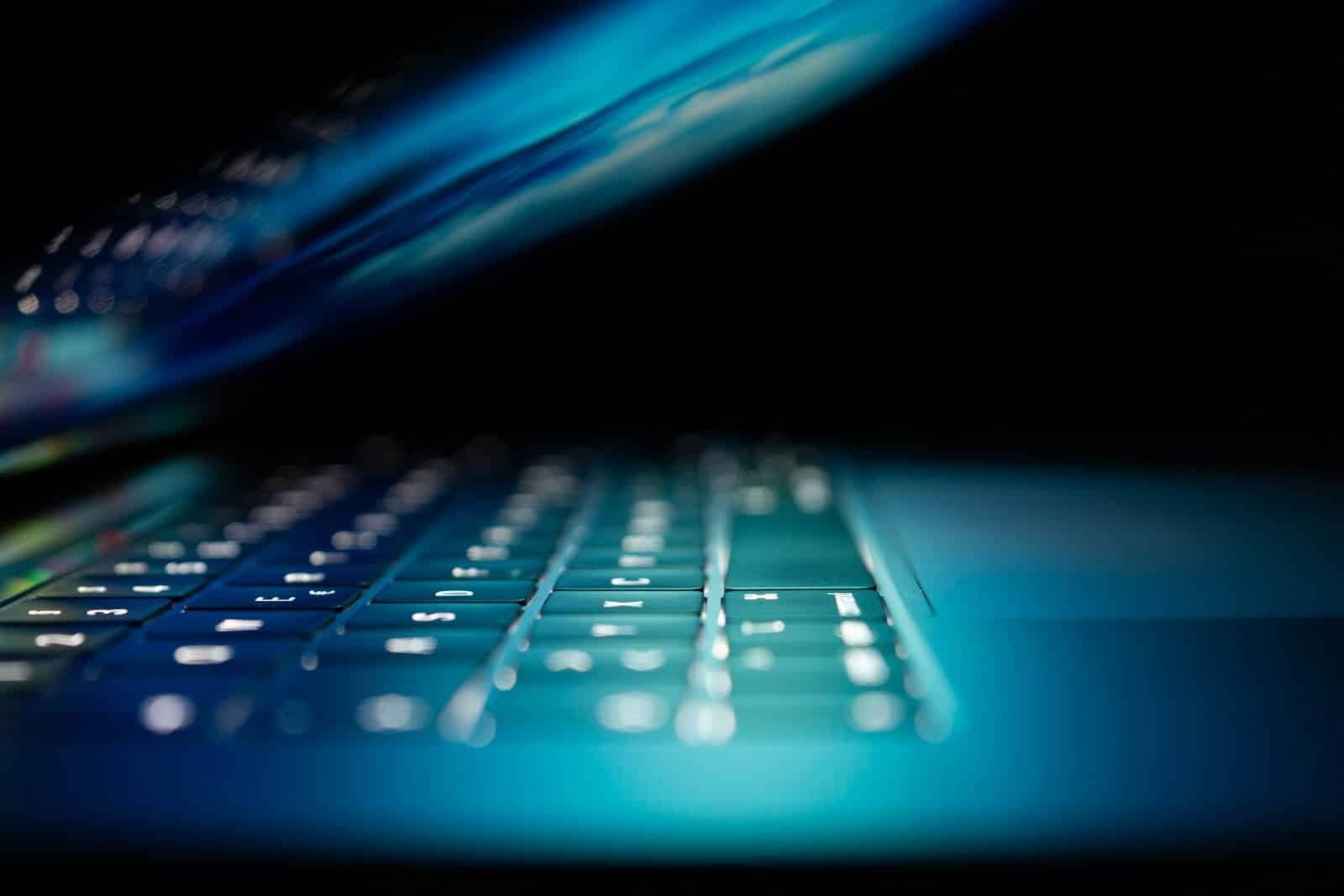 Computer workstation with illuminated digital interface illustrating CRM and website integration